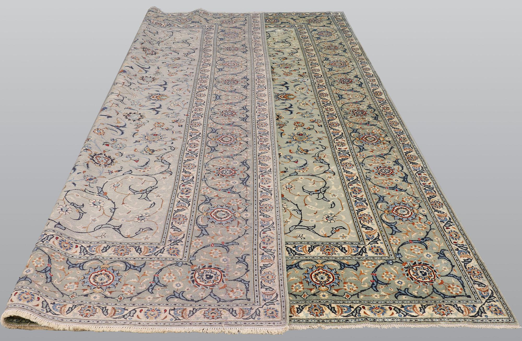 A carpet, Kashan, signed, ca 404 x 280 cm.