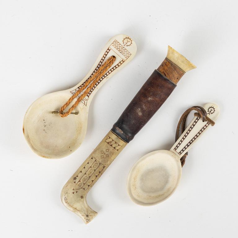 A rendeer horn knife and two spoons, unidentified signature AB.