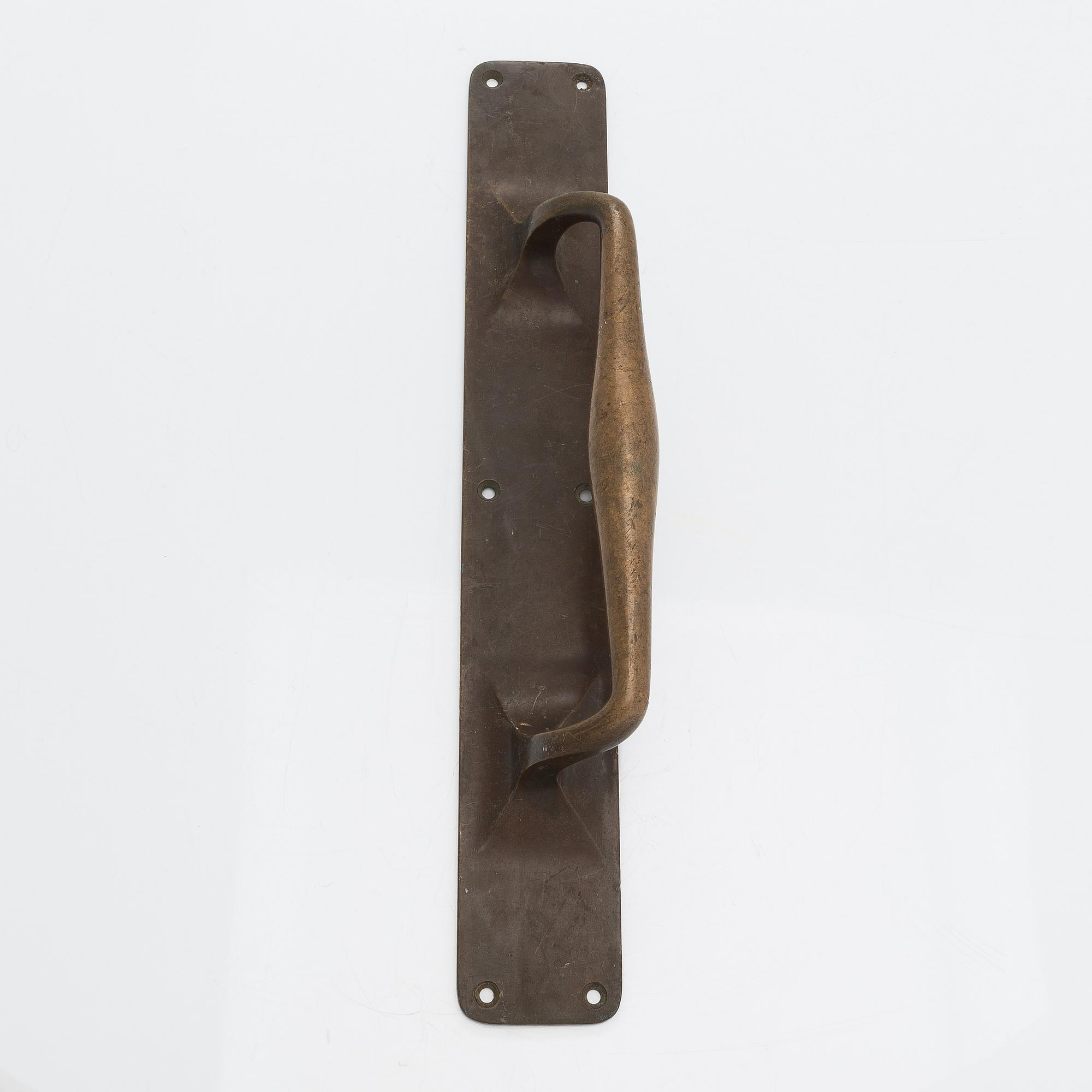 An Art Nouveau door handle from early 20th century.