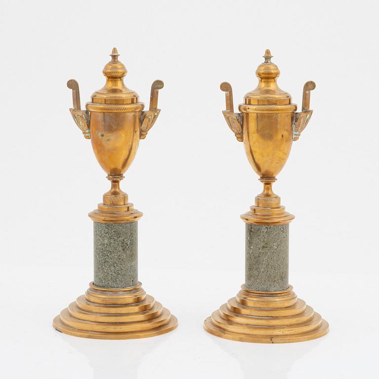 A pair of brass cassolettes from Skultuna Bruk.