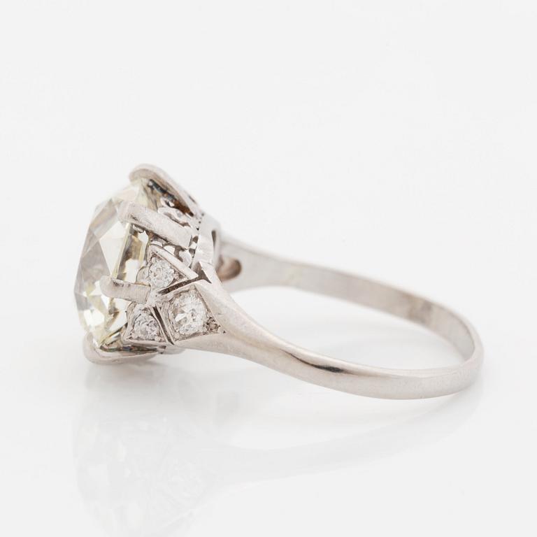 A platinum ring set with an old-cut diamond.