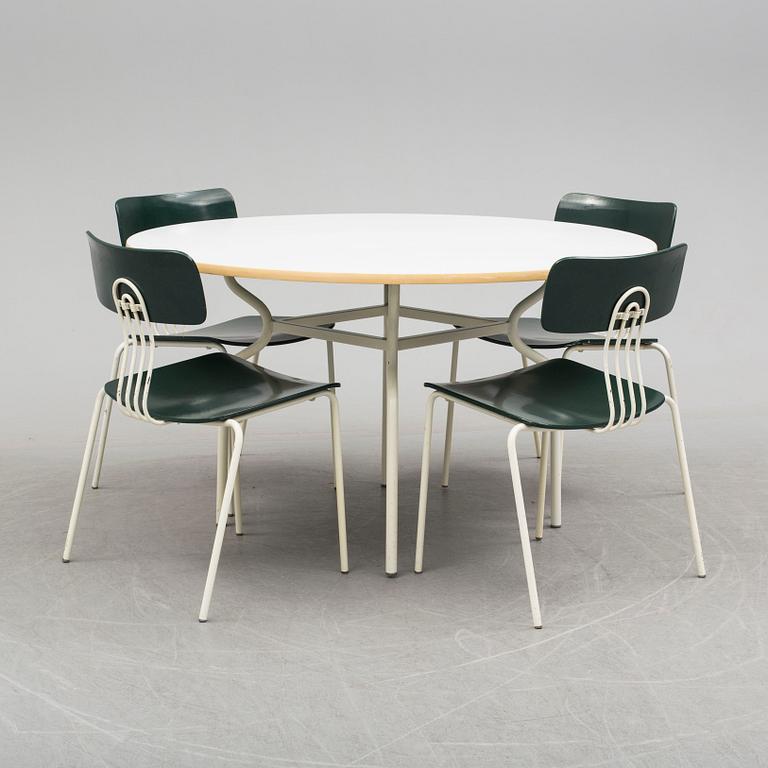 a dining table with four chairs by Sigurd Persson, latter part of 20th century.