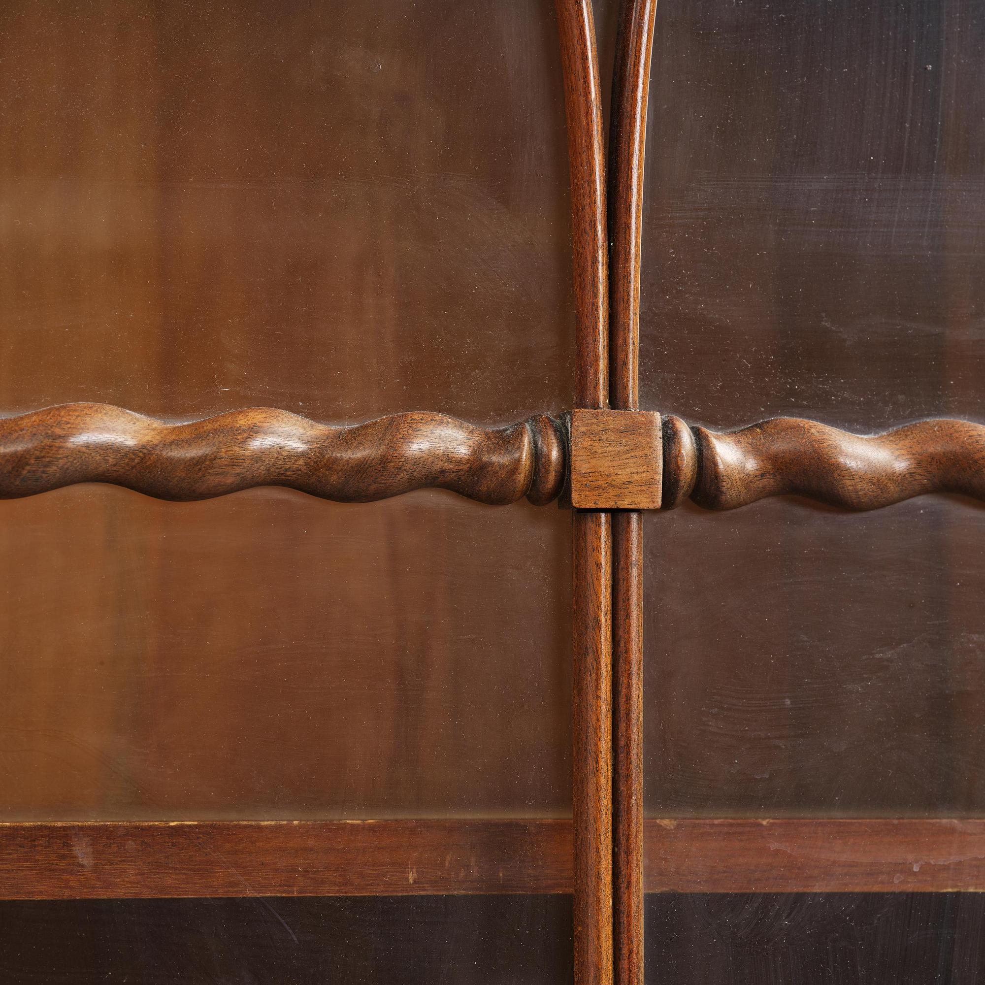 A pair of late Empire mahogany book cabinets, Stockholm, 1820/30's.