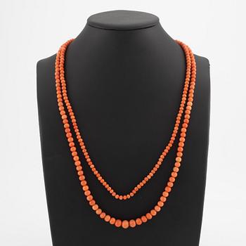 Necklace with graduated coral beads.