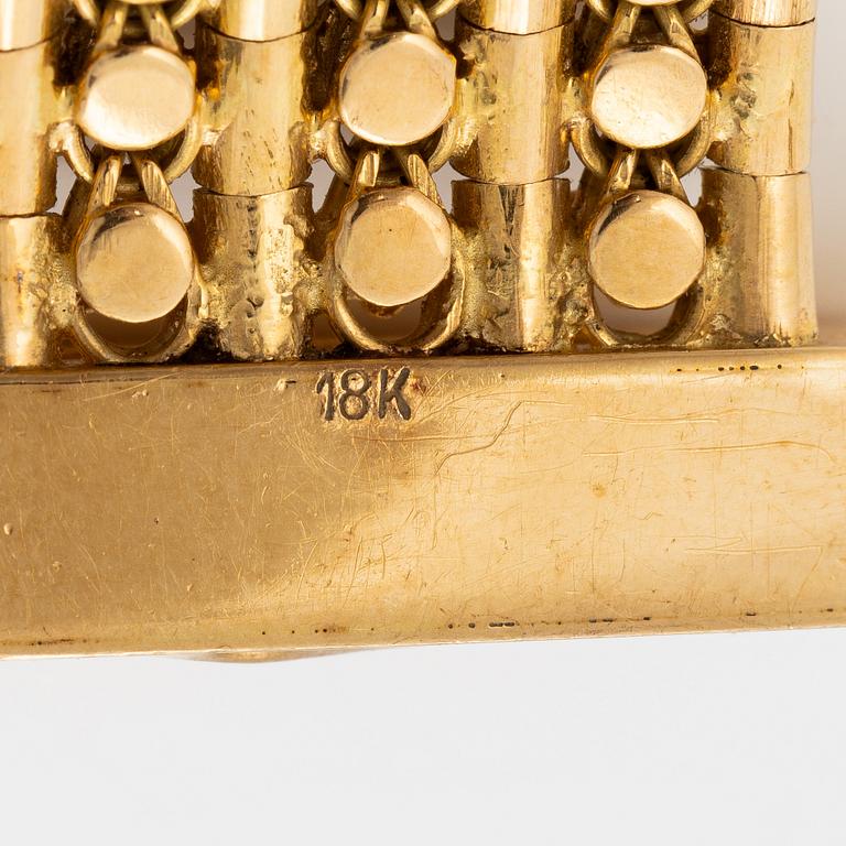 Armband 18K guld med tofs, 1900-talets andra hälft.