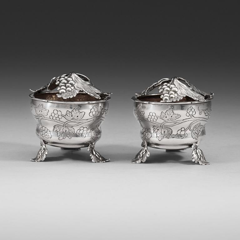 A pair of German 18th century parcel gilt jelly-pots, marks of  Johann Christoph Seelingslow, Magdeburg.