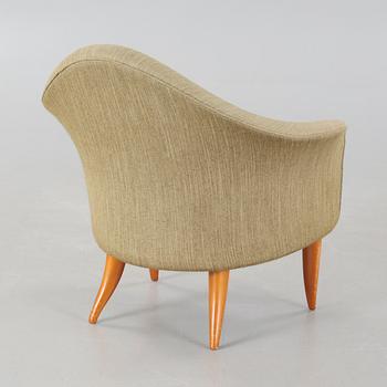 A 'Lilla Adam' easy chair by Nordiska Kompaniet.