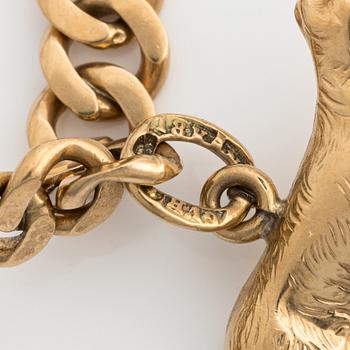 Bracelet 18k gold with charms.