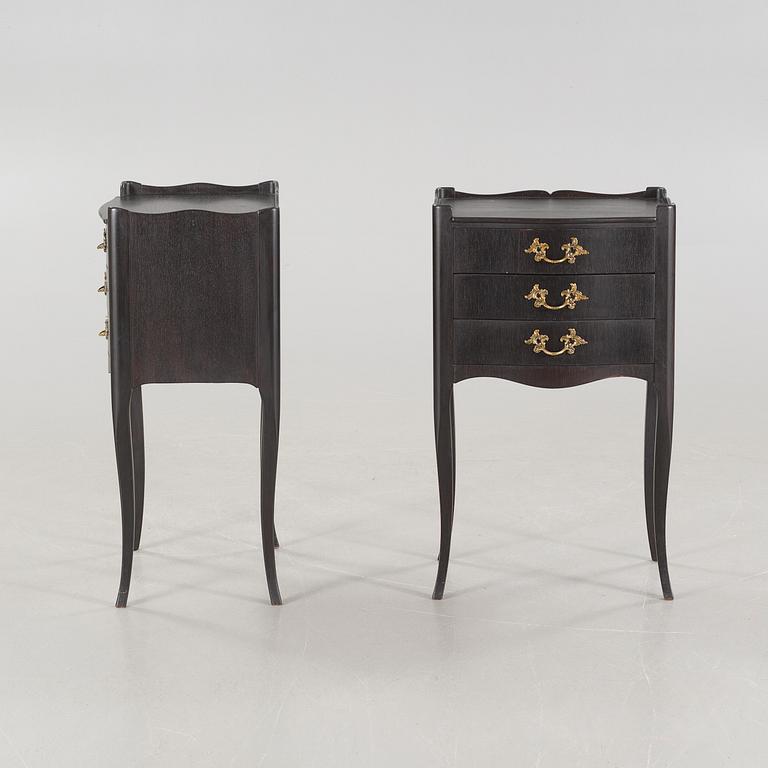 A pair of rococo style bedside tables from the second half of the 20th century.