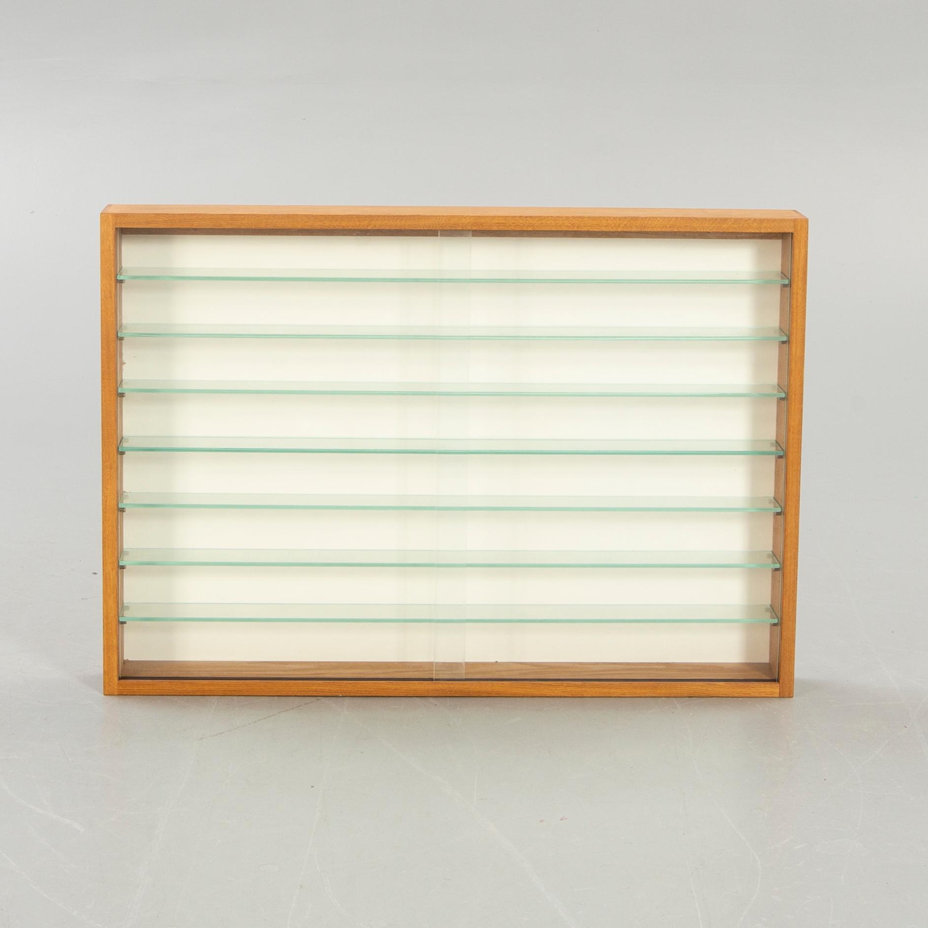 Glass display cabinet, second half of the 20th century.