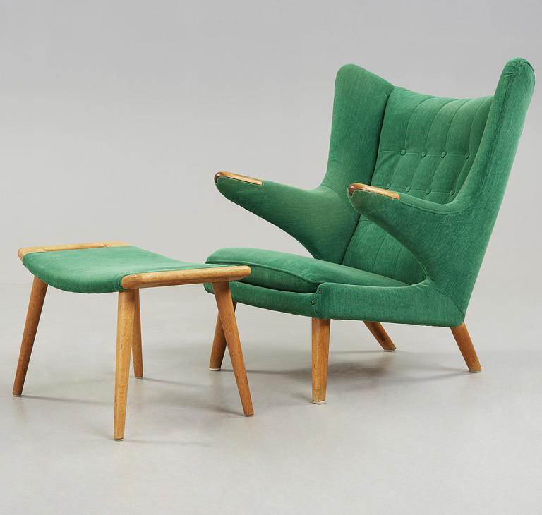 A Hans J Wegner 'Papa bear' esy chair with ottoman, AP-stolen, Denmark 1950-60's.