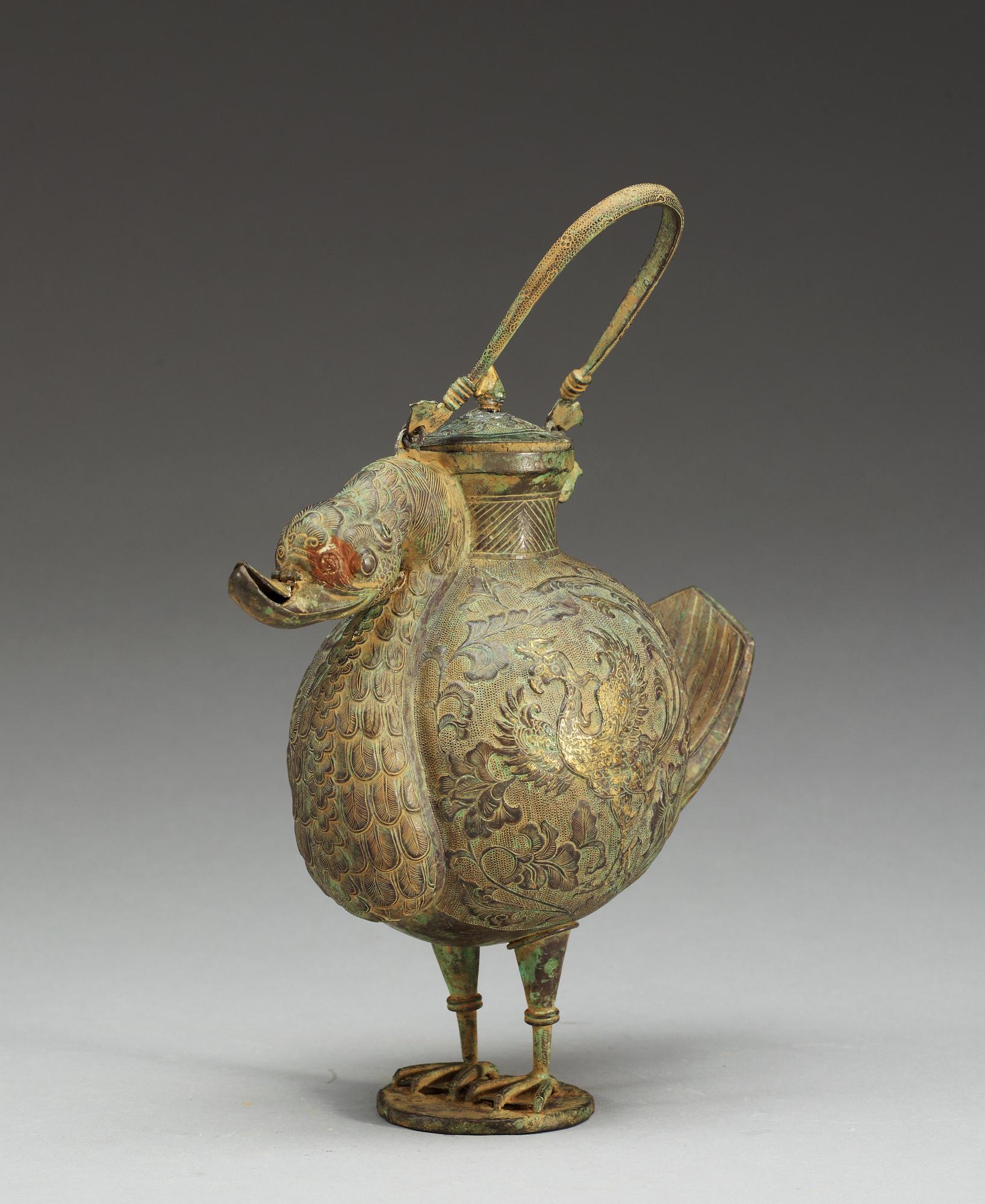 KANNA med LOCK, metall. Kina. Trol 1900-tal.