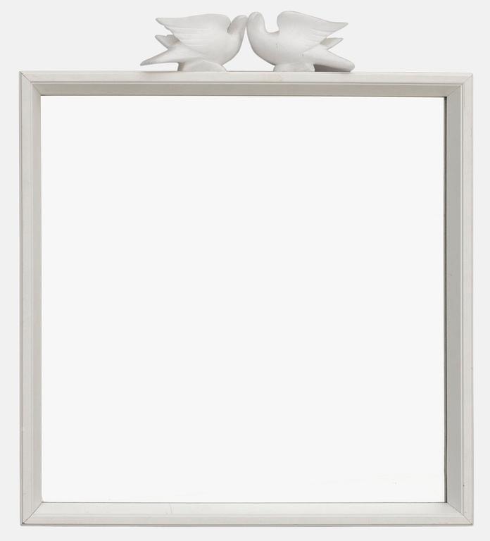 An Estrid Ericson wooden framed mirror with a pair of alabaster pigeons, Firma Svenskt Tenn.