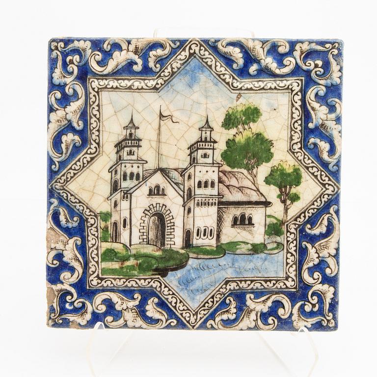 A Persian (Iranian) tile, glazed pottery, Qajar dynasty, 19th century.