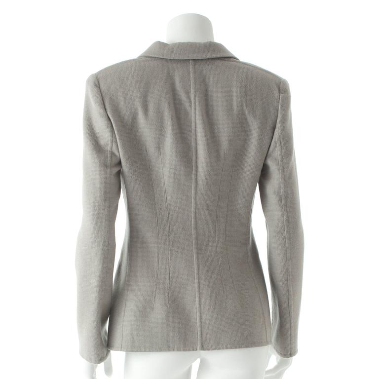 ARMANI, a grey cashmere jacket.