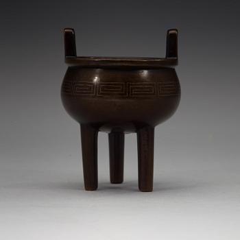 A bronze tripod censer, Qing dynasty, 19th Century with Xuandes six character mark.