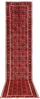 A Hosseinabad runner, c 414 x 95 cm.