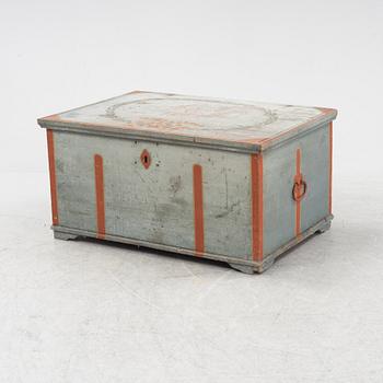 A painted chest dated 1824.