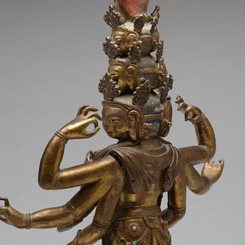 A Tibeto-Chinese gilt bronze figure of eleven-headed Avalokiteshvara, 19th Century.