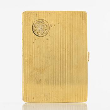 Travel photo album, 18K gold, with monogram.