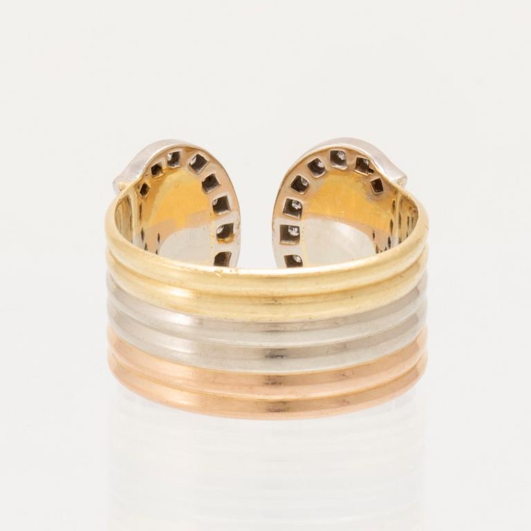 A Cartier "Double C" ring 18K tricolor gold set with round single-cut diamonds.