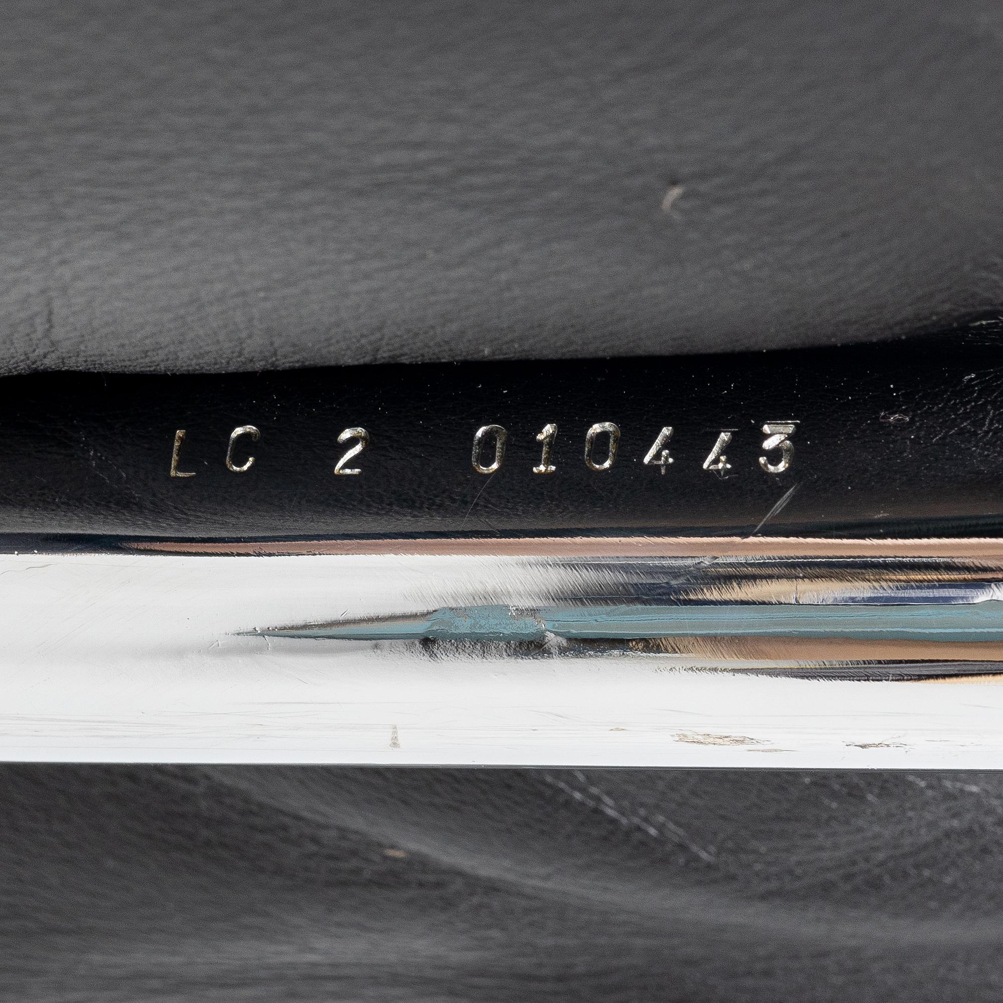 a pair of "LC2" armchairs, Cassina, second half of the 20th century.