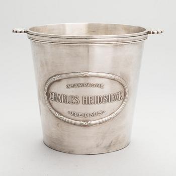 A silver plated brass Charles Heidsieck Champagne cooler.