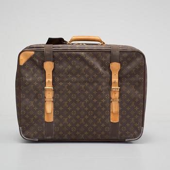 LOUIS VUITTON, a mongram canvas suitcase.