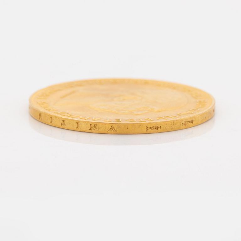 An Austrian gold coin, re-strike 100 Corona 1915.