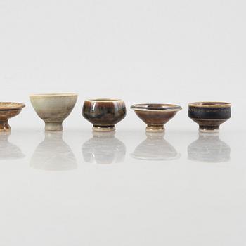 Höganäs, a set of 27 stoneware miniatures, including John Andersson and Gunnar Borg.