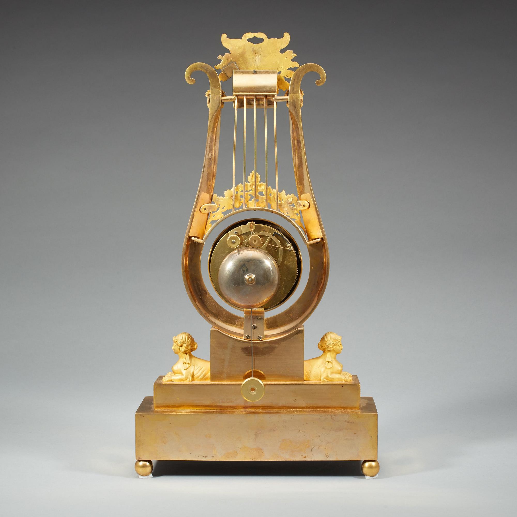 A late Gustavian early 19th century gilt bronze mantel clock.