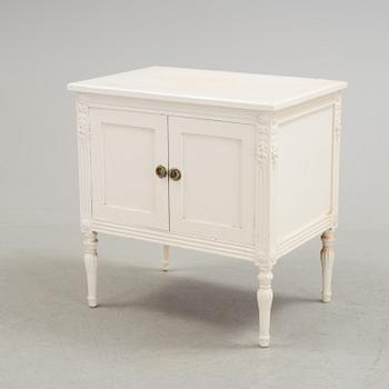 An early 20th century Gustavian style cupboard.