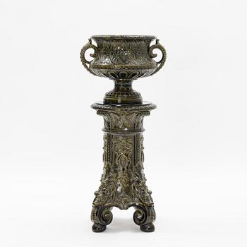 A majolica pedestal with urn from Rörstrand, early 20th Century.