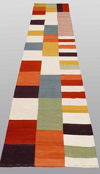 A runner, flat weave, ca 344 x 77 cm.