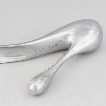 Manolo Blahnik, a metal shoe horn, 21st century.