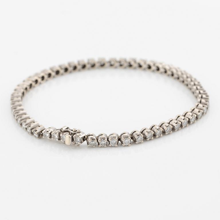 Tennis bracelet, 18K white gold and brilliant-cut diamonds.