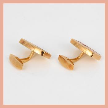 MANSCHETTKNAPPAR samt ARMBANDSUR, 18K guld med korall och olika slipade diamanter, Omega.