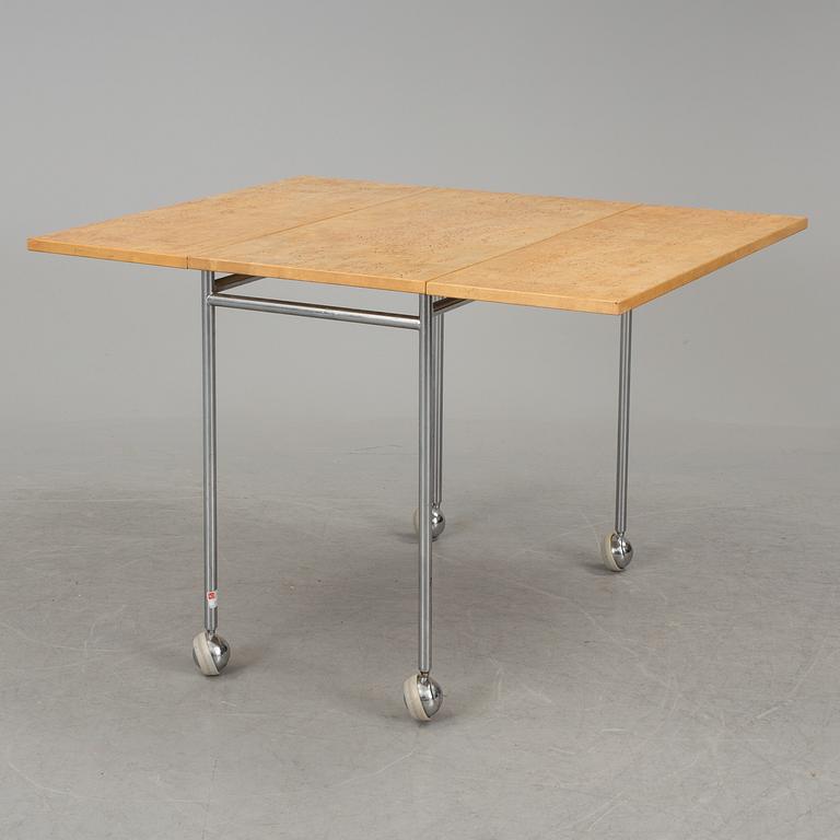 A "Berit" table by Bruno Mathsson.