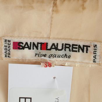 YVES SAINT LAURENT, a creme color silk jacket.