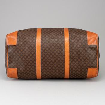 CÉLINE, a 'Macadam Duffle' bag.