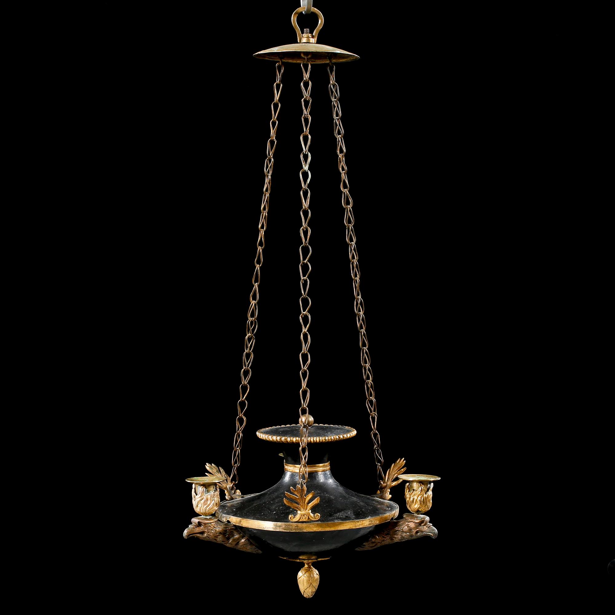 An empire three-branch chandelier, made in the first half of the 19th century.