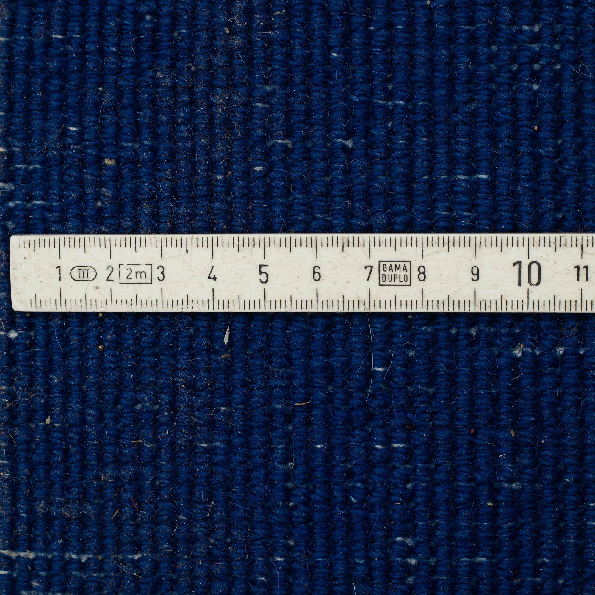 A CARPET, China, ca 304,5 x 242,5 cm (as well as 3 cm flat weave at the ends).