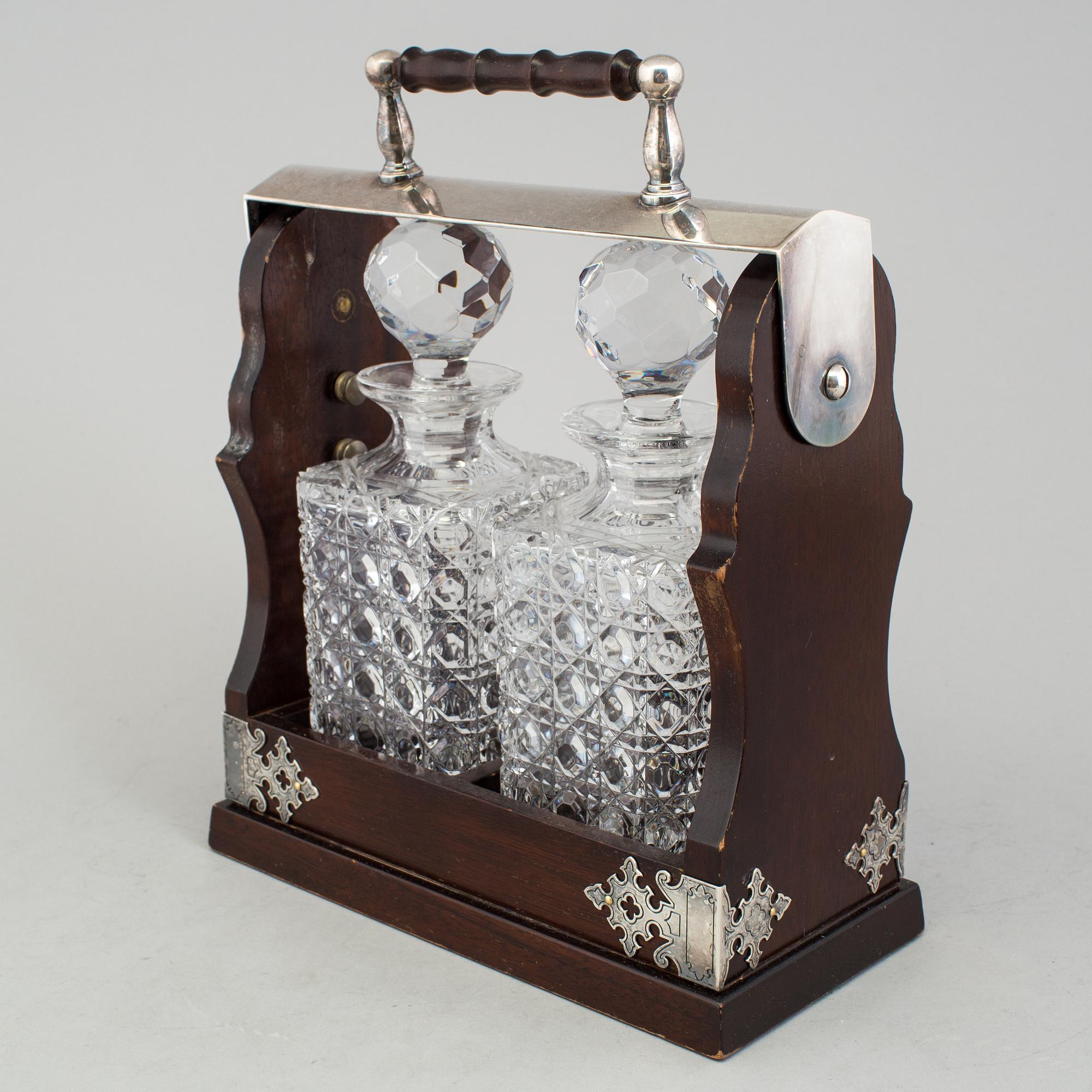 A BOTTLE HOLDER FOR TWO BOTTLES. 20th CENTURY.