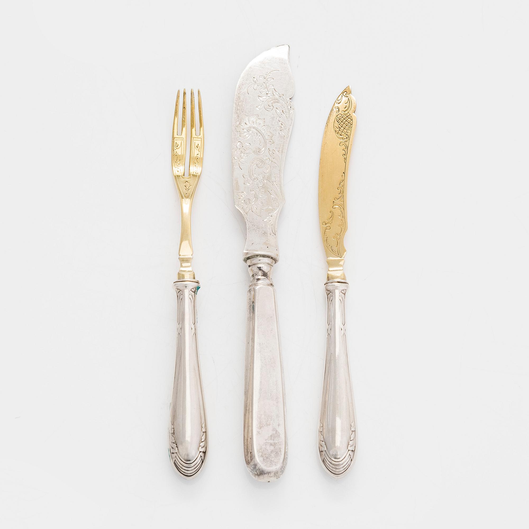 A 12-piece set of parcel-gilt fruit cutlery, and a silver butter knife, maker's mark Iisakki Saha, Pori 1898-1899.