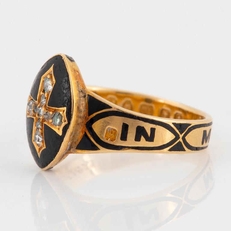 A mourning ring in 18K gold and black enamel set with rose-cut diamonds.