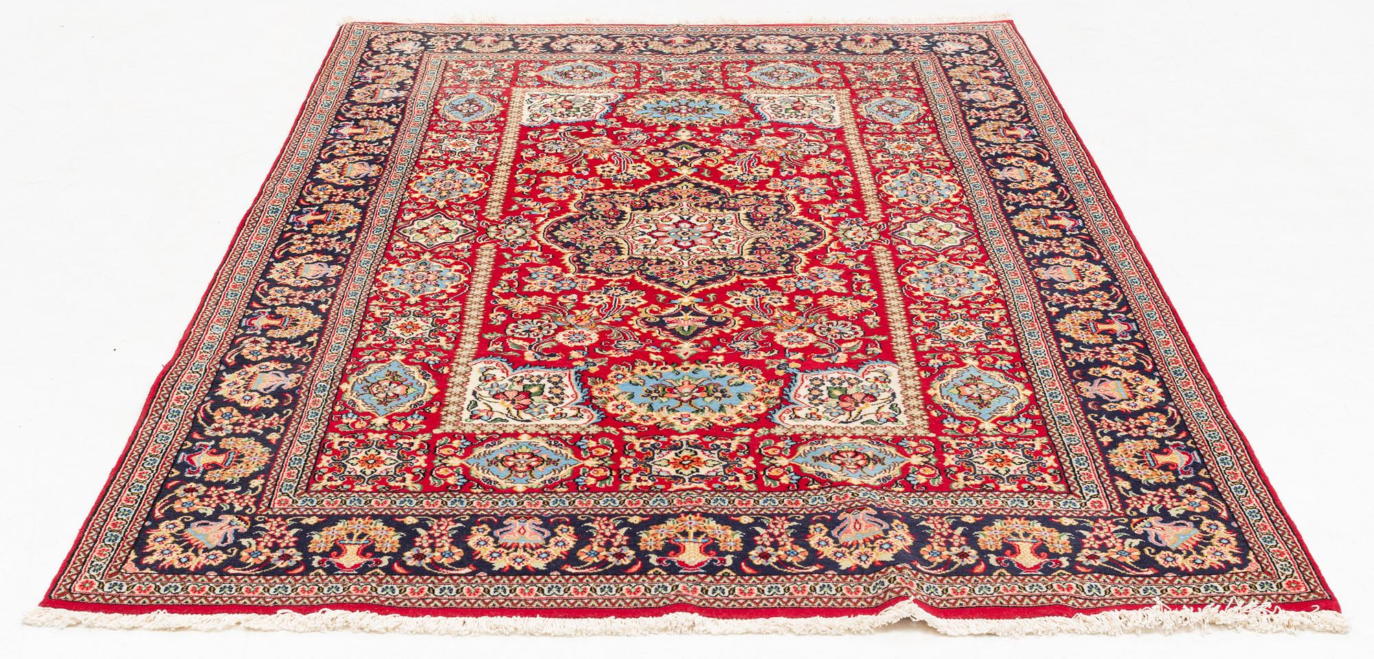 An oriental rug, c. 260 x 162 cm.