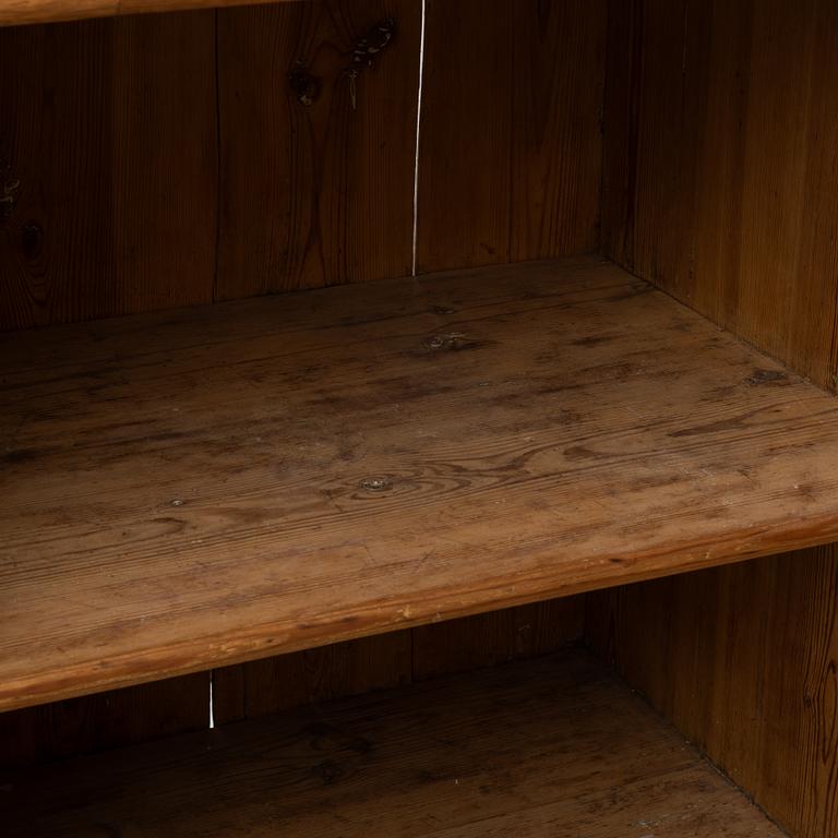 An 18th two-part pine century cabinet.