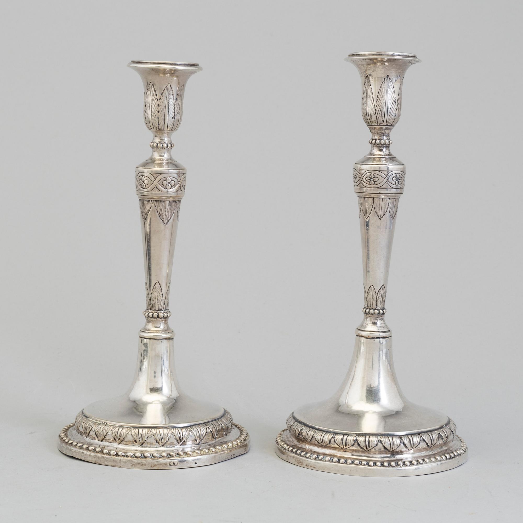 A pair of Italian early 19th century candlesticks, mark of Naples 1804.
