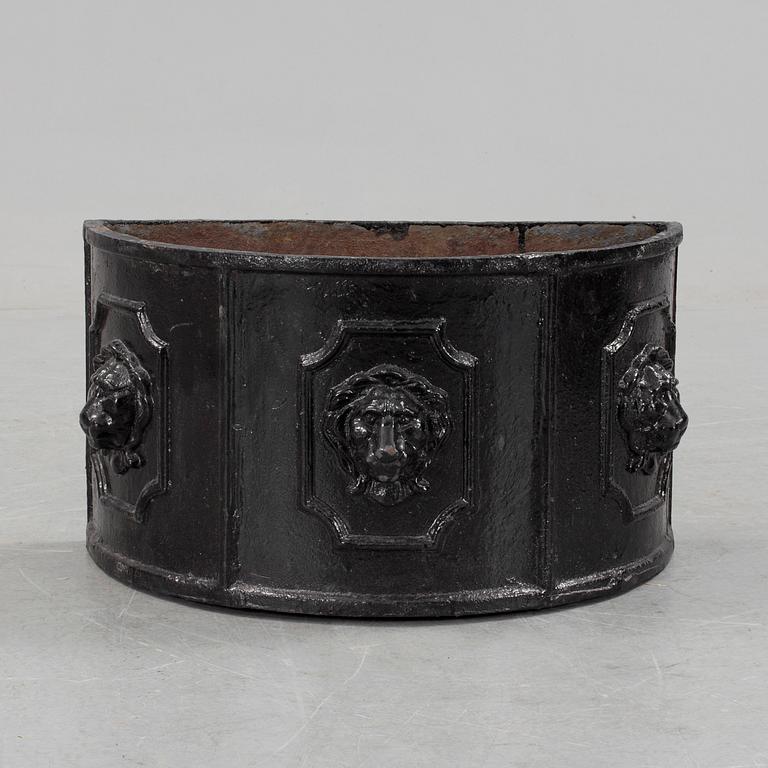 A cast iron jardeniére, 20th century.