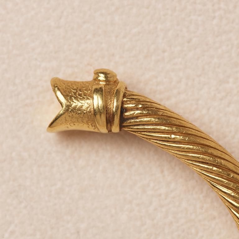 A Greco-Roman style presumably modern gold bracelet.